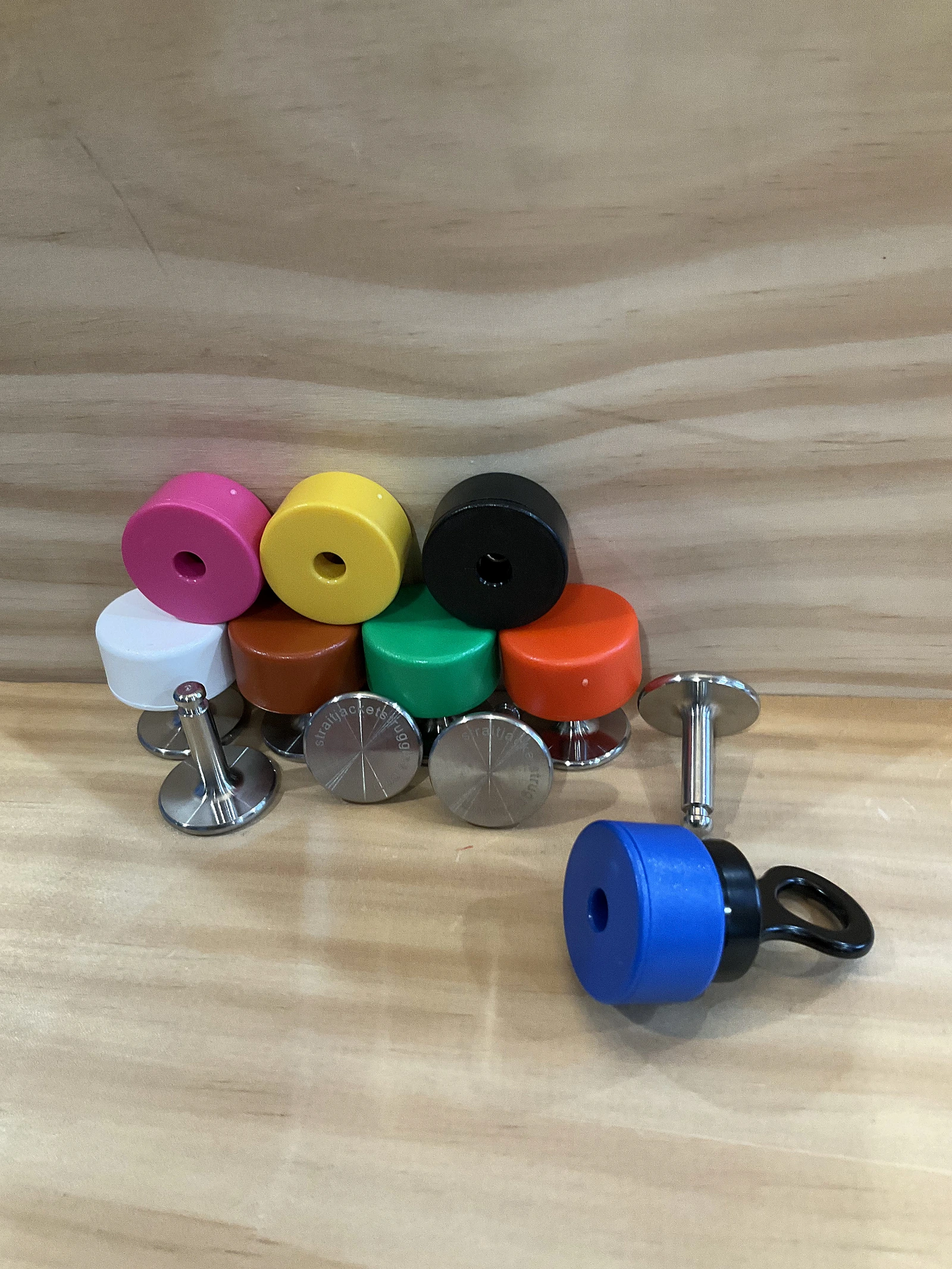 SEGUFIX-style magnetic pin locks, colored caps, and keys arranged together.